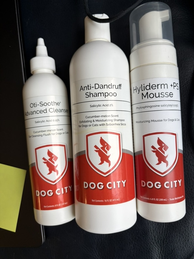 Three Dog City grooming products: Oti-Soothe cleanser, anti-dandruff shampoo, Hyliderm PS mousse